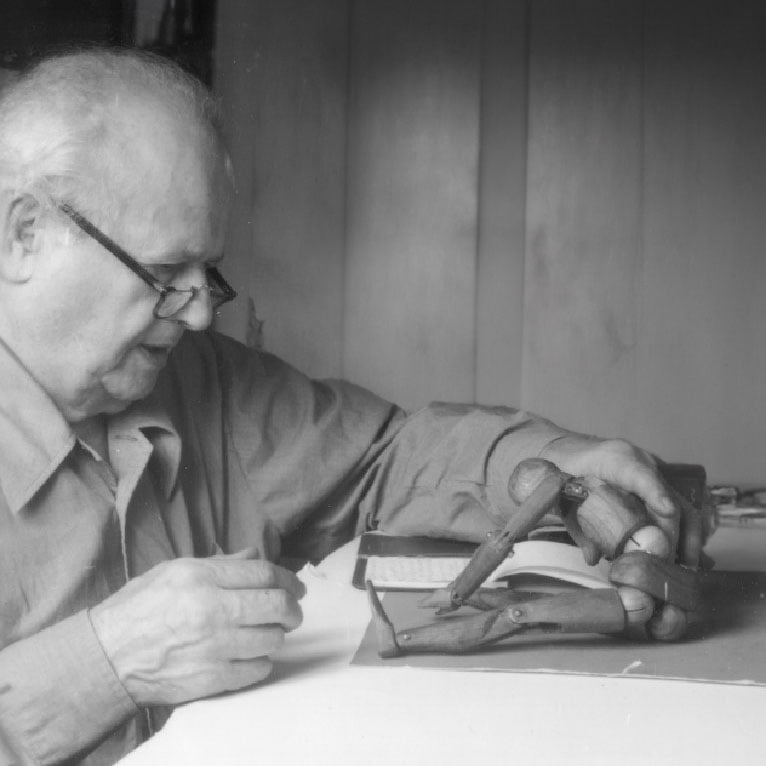 IFF_Moshe_Feldenkrais_working_on_doll_h